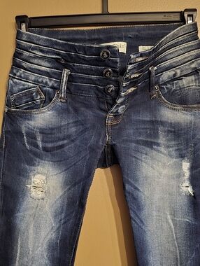High-Rise Distressed Dark Blue Jeans with Multi-Button Waist